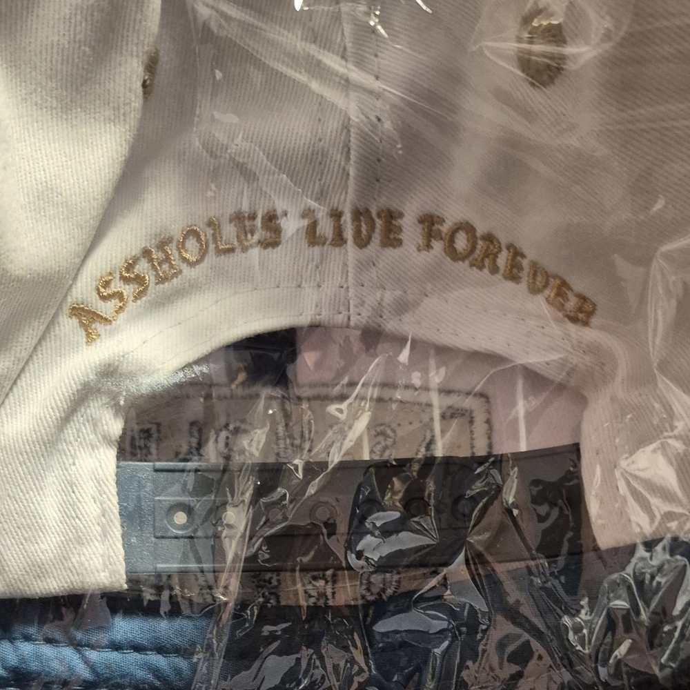 White and Blue Cap with Bold Text - Picture 2 of 2